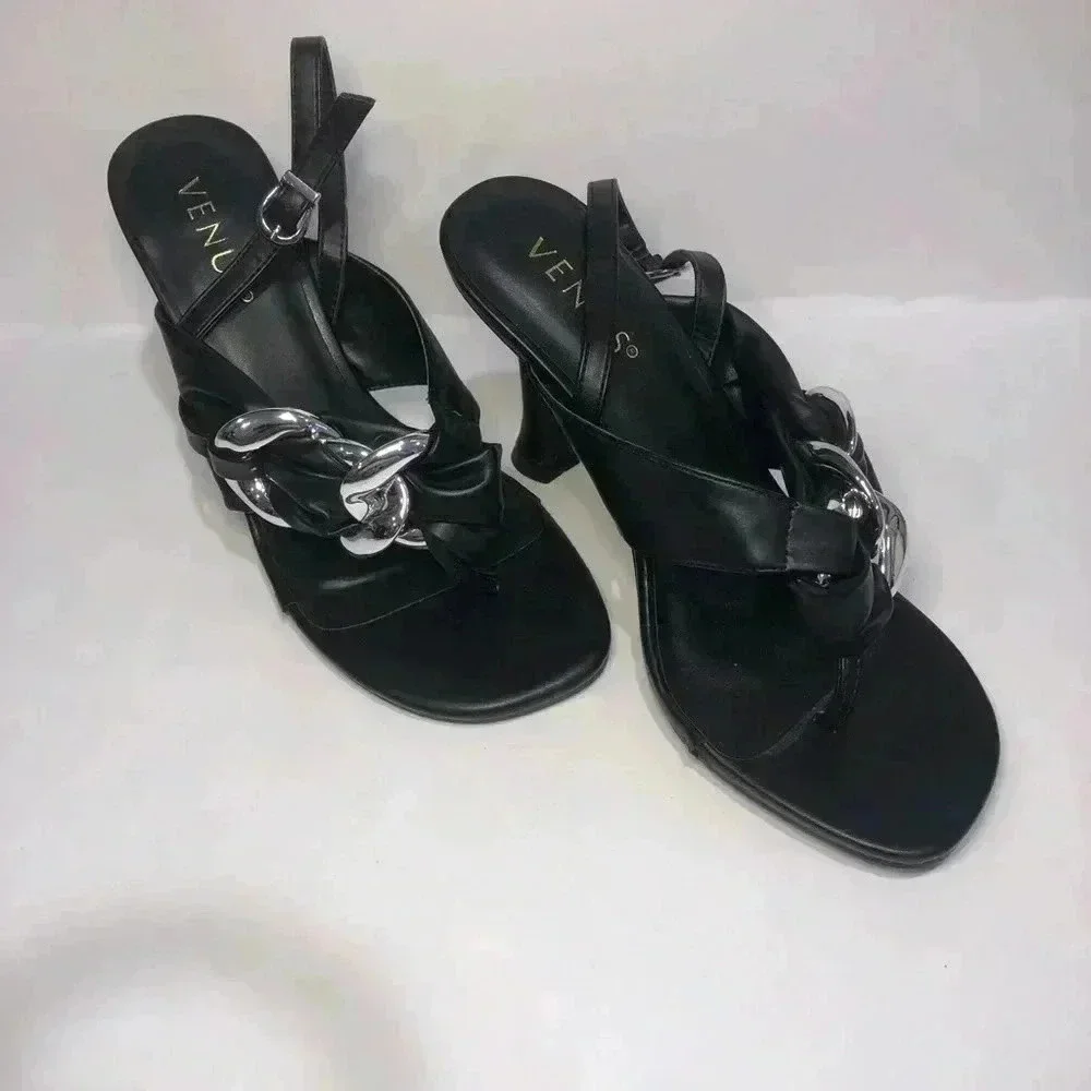 Black and silver heels size 7.5